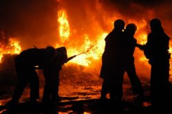 Firefighter fighting house fire regarding the ban on consumer fireworks