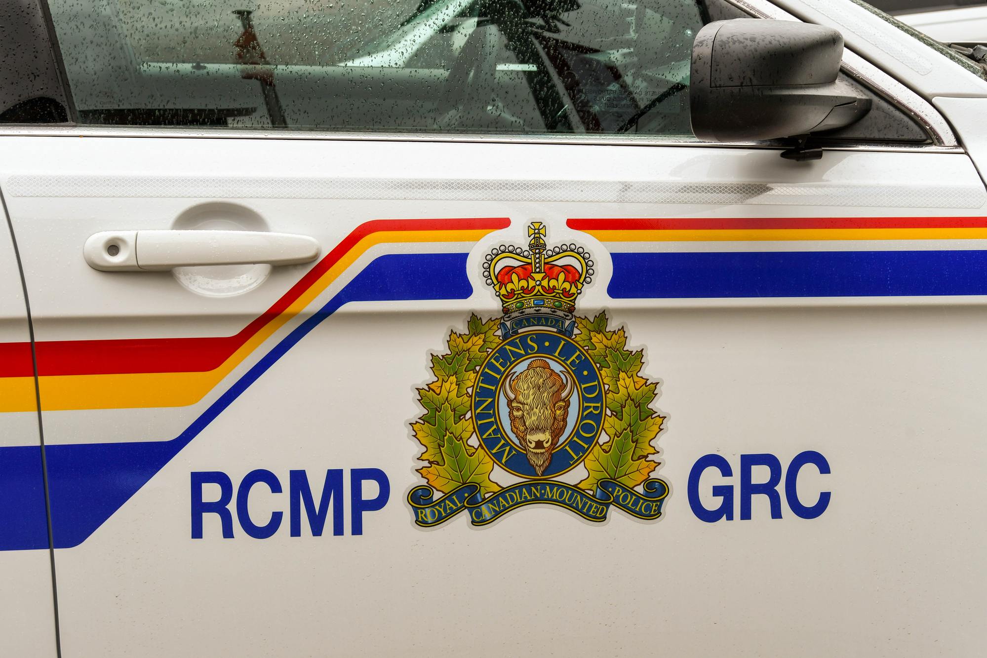 RCMP car door regarding the RCMP racism class action lawsuit filed