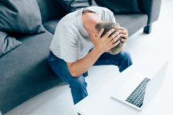 ashamed man regarding the MindGeek class action lawsuit 