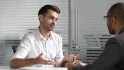 Man talking with lawyer regarding information on long term disability insurance in Canada
