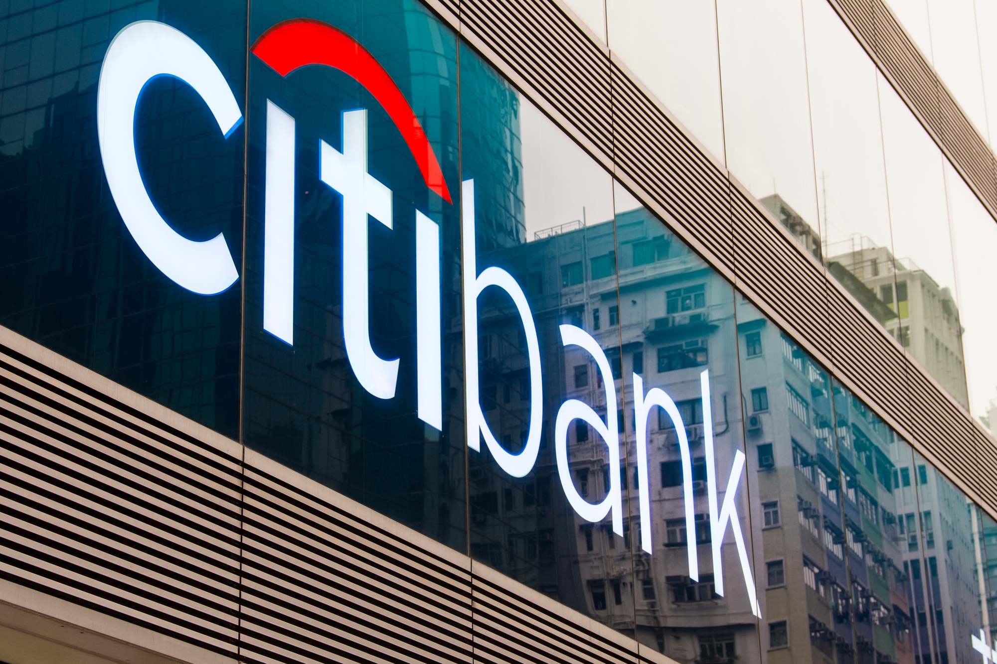 A Citibank sign regarding a Calgary couple suing the bank for selling millions of shares during COVID-19 chaos