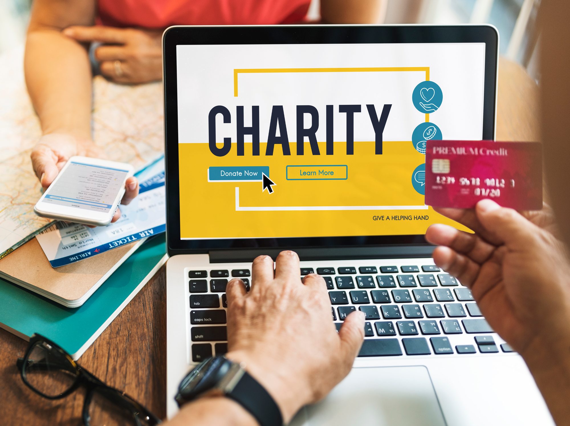 Person making donation regarding the GLGI charitable donations scam class action lawsuit settlement
