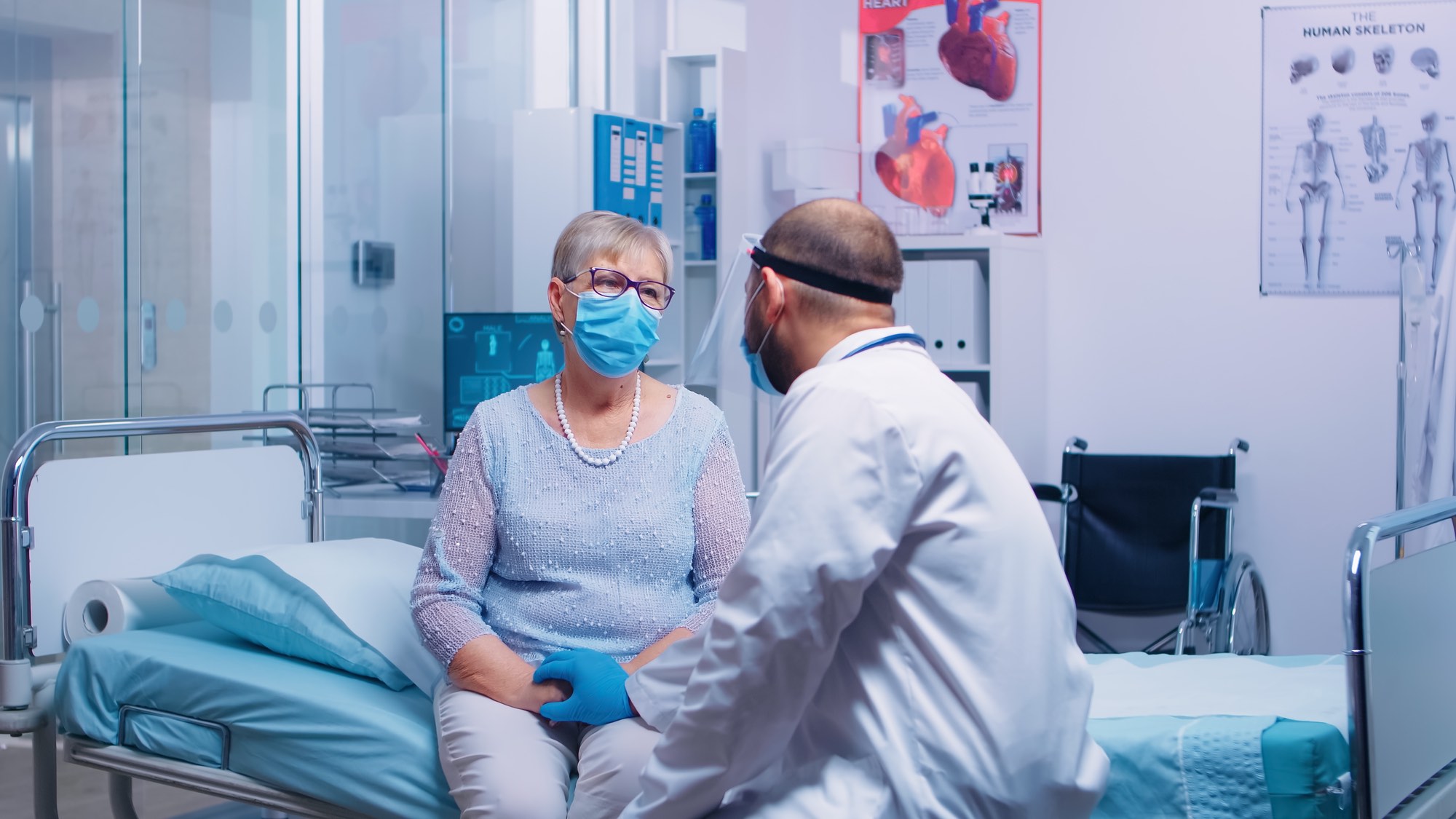 woman in hospital with covid as government promises new standards