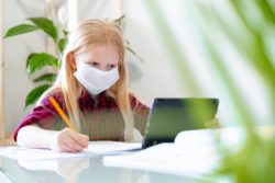girl distance learning due to COVID-19