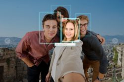 group taking selfie with camera lining up faces regarding the RCMP facial recognition class action lawsuit filed