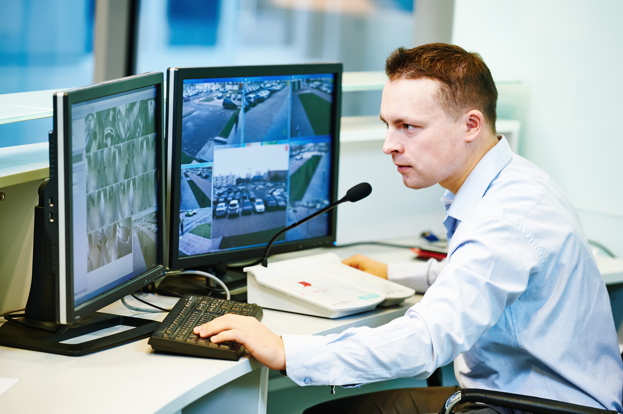 Man looking at surveillance regarding the privacy class action lawsuit filed in Vancouver