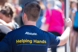 Man wearing Allstate Insurance shirt regarding the Allstate Insurance Company class action lawsuit filed 
