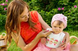 Mom using wipe on baby regarding the Cottonelle class action lawsuit