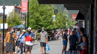 people walking in banff during COVID-19