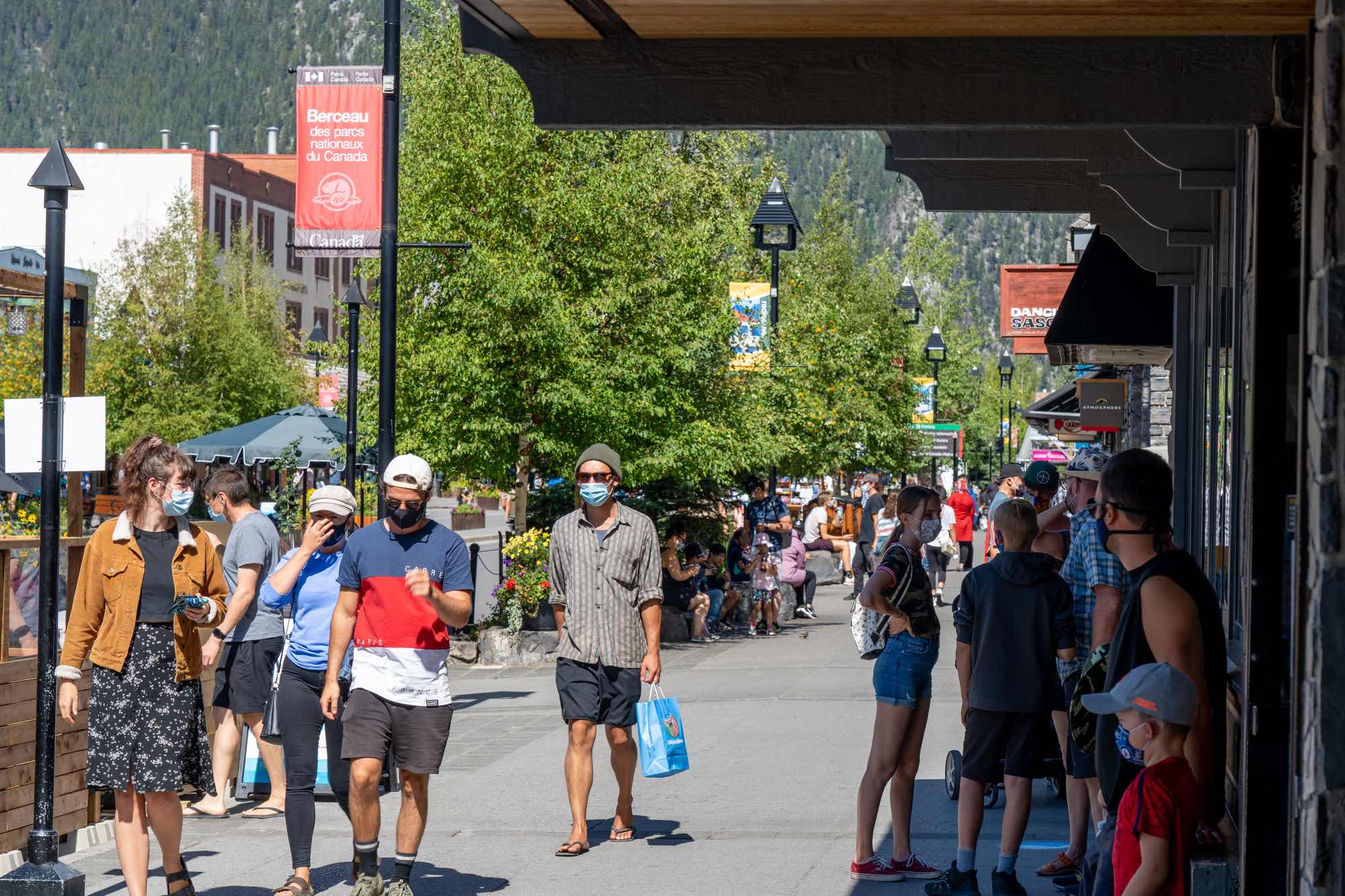 people walking in banff during covid