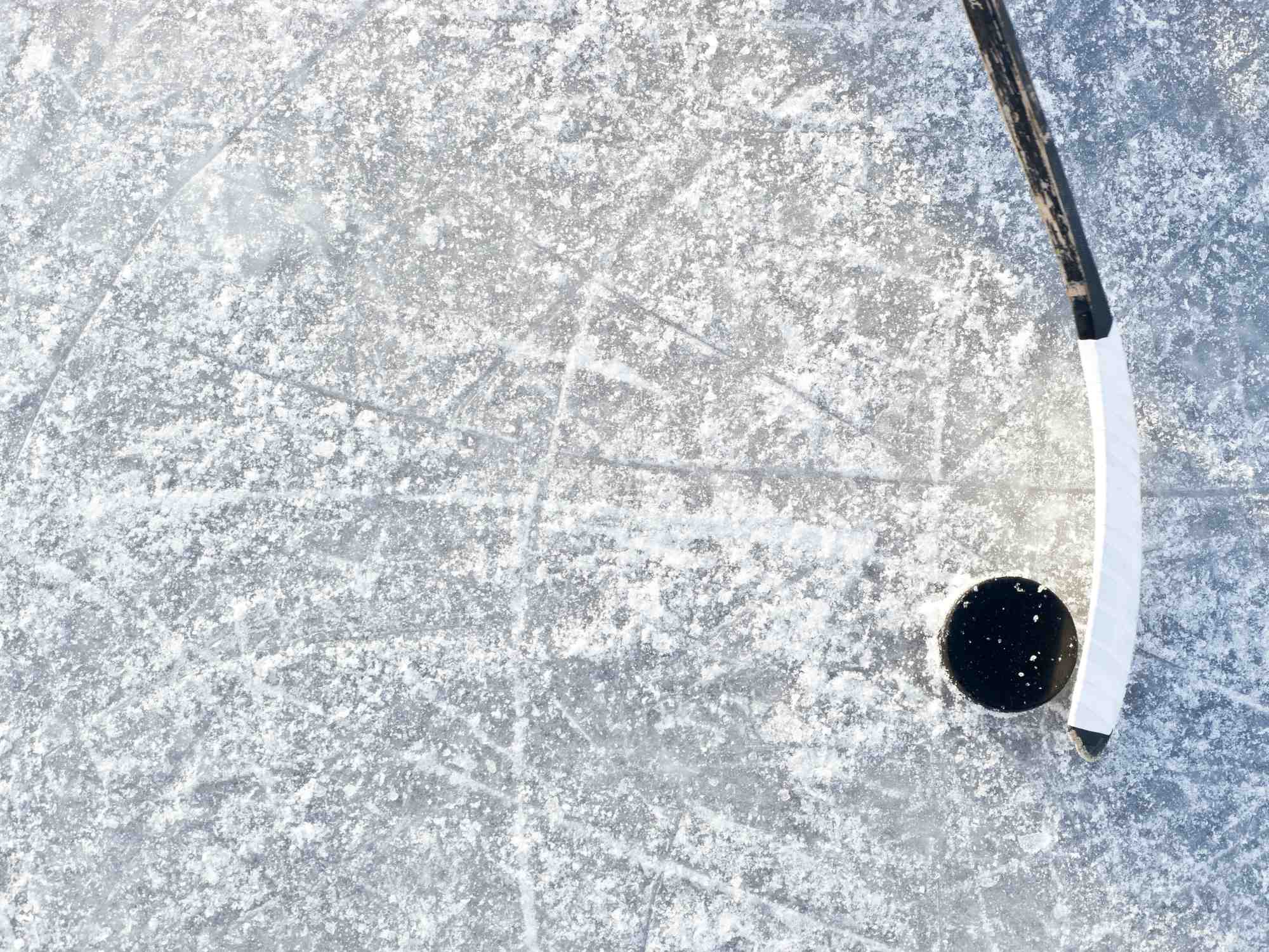 Hockey puck on ice regarding the junior hockey league class action settlement being on thin ice