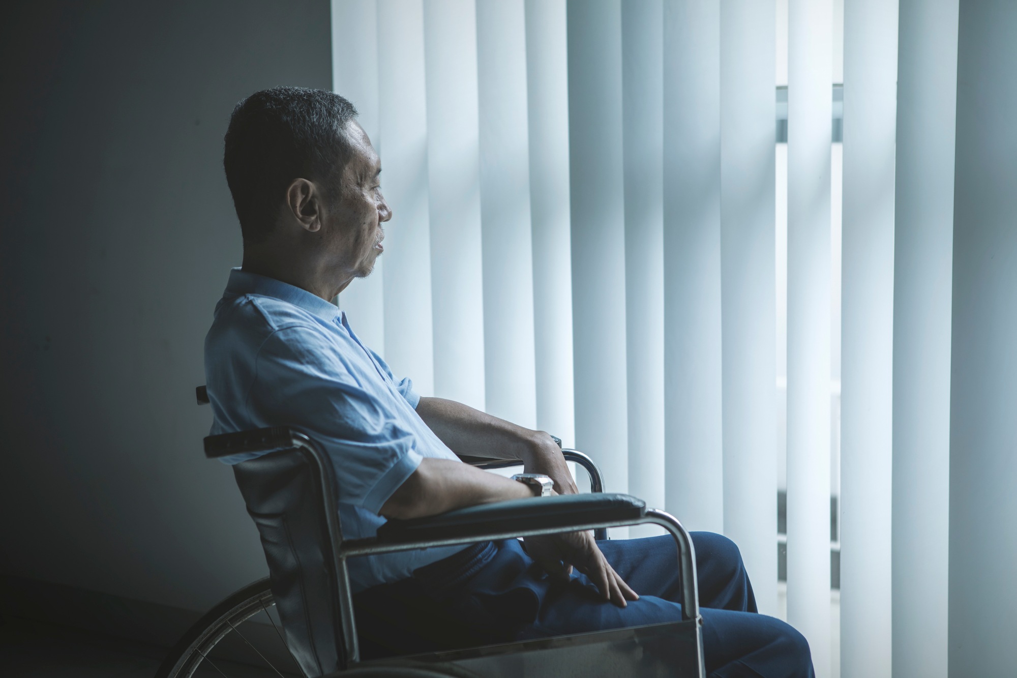 Sad elderly man regarding the Ontario long-term care homes class action lawsuit
