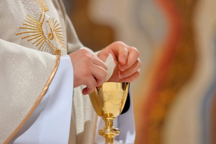 Priest celebrate mass at the church