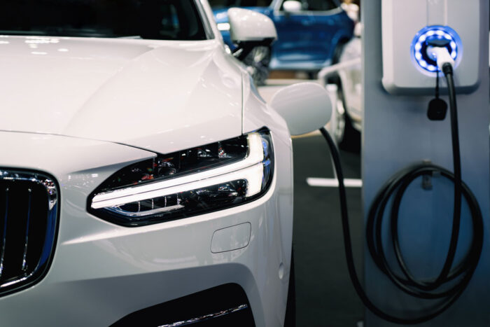 Power supply for hybrid electric car charging battery. Eco car concept.