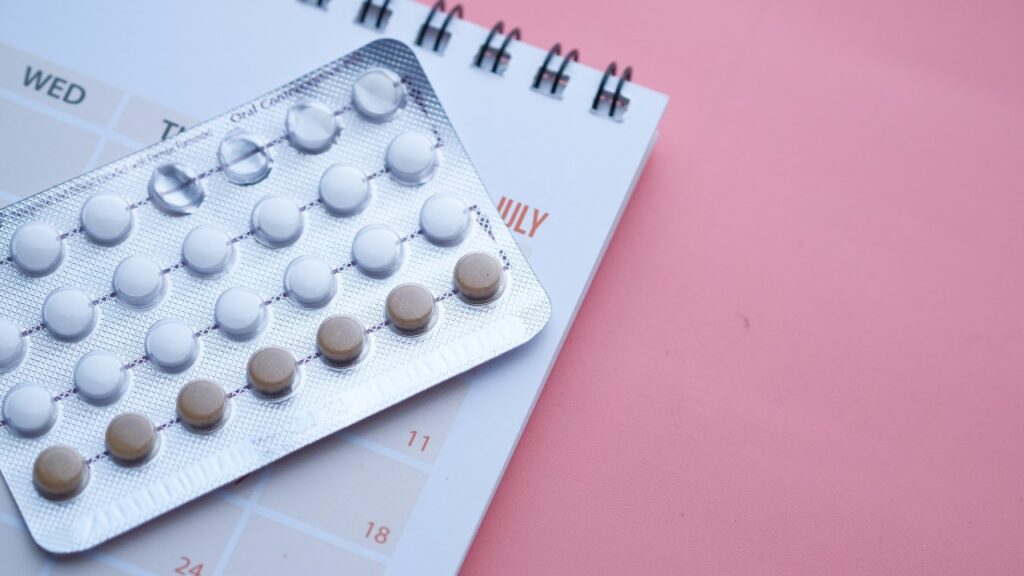 Concept for birth control with monthly calendar.