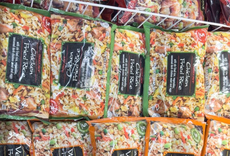 A view of several packages of Trader Joe's fried rice.