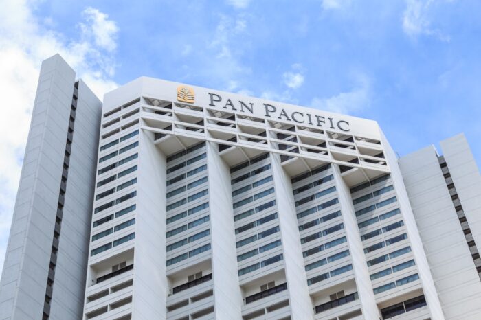 Looking up at the building of the Pan Pacific Hotel, Raffles Boulevard, Singapore.
