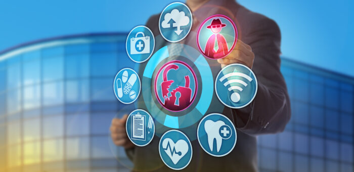 Unrecognizable male cybersecurity manager spotting a hacking attack on health care data.