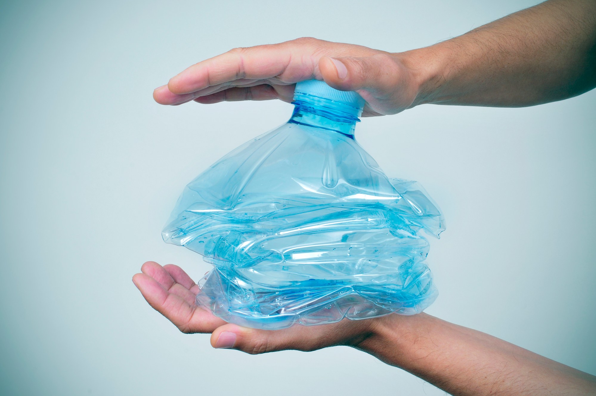 Person smashing plastic regarding the LOOP Canada class action lawsuit