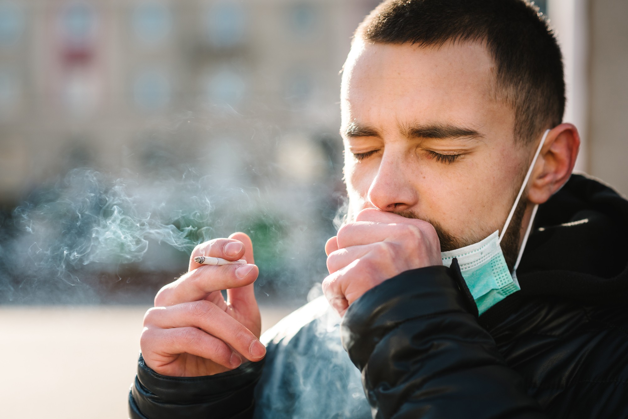 Tobacco smoker coughing regarding the stay granted to big tobacco companies