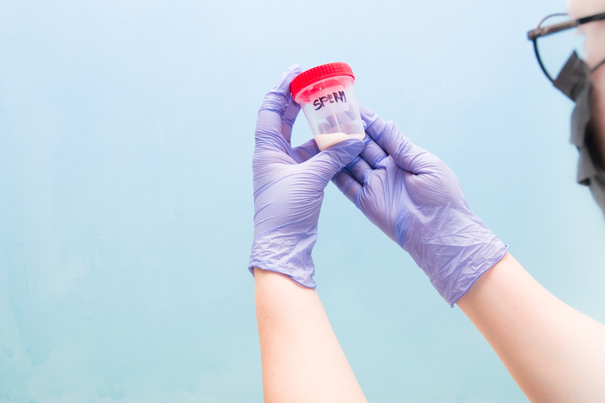 Doctor examining sperm donor regarding the sperm bank lawsuit 