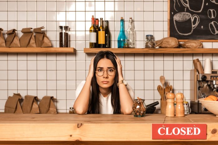 Stressed business owner regarding the business interruption class action lawsuit filed