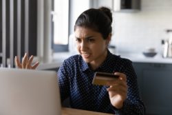 Woman stressed after overdraft fee regarding TD bank FAQ