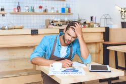 Stressed business owner regarding information on Intact Insurance Company business interruption claims