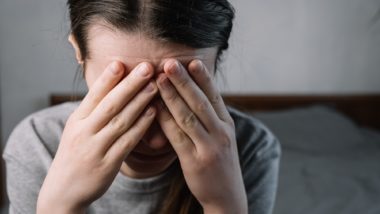 Upset woman with face in hands regarding the Methadose class action lawsuit