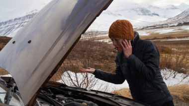 Woman having car trouble regarding the Fiat Chrysler Automobile class action lawsuit filed