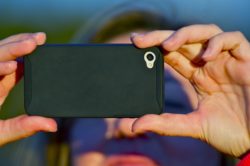 Woman recording police brutality with cellphone