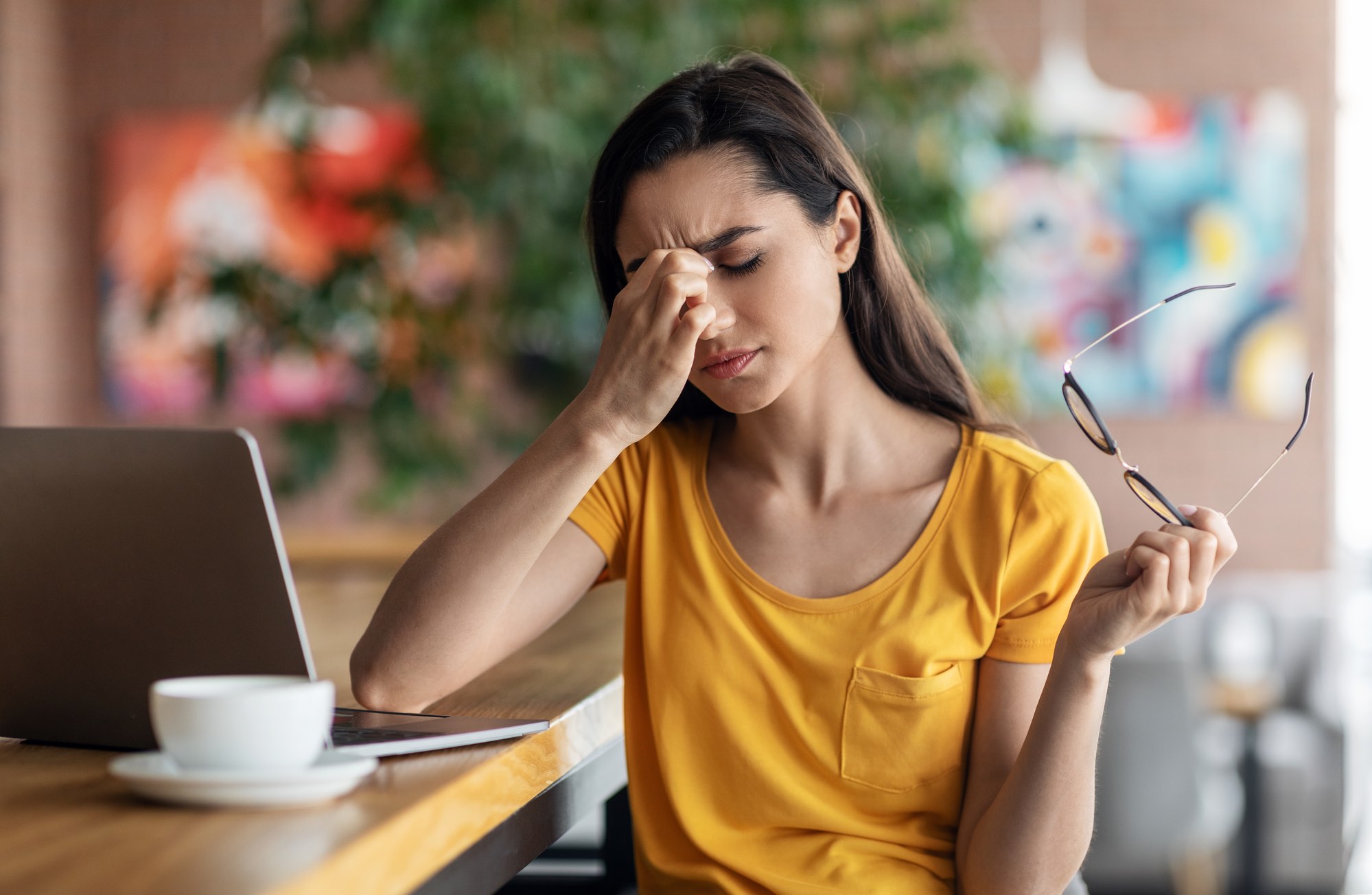 Woman using laptop data breach